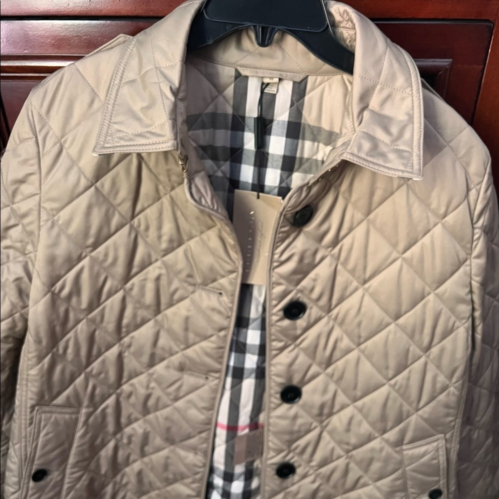 Brand new Burberry quilted womens jacket. XL